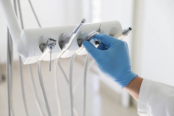 Professional Tooth Extraction technician working in Cass City, MI